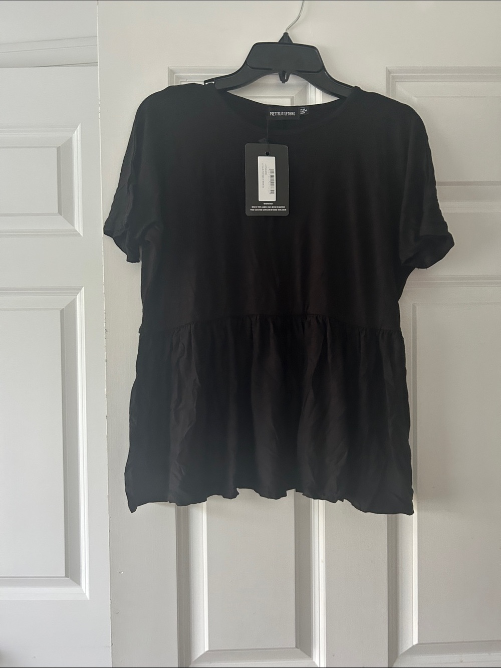 PrettyLittleThing Black Short Sleeve Peplum Tunic